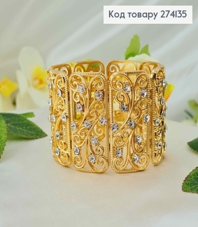 Браслет изысканный, золотого цвета с вензелями и перламутровыми камешками. 274135 фото