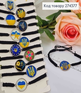 Браслет нить, на затяжке, с символикой Украины, черный, светится в темноте. 274377 фото
