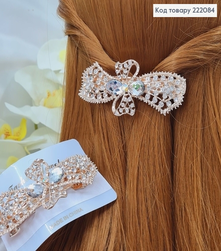 Заколка автомат металл 8,5*3,3см  БАНТИК в камінцях золотого кольору 222084 фото 2