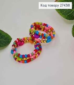Браслет пружинка с цветными бусинками. 274318 фото