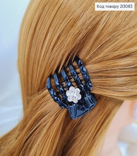 Краб черный рогач с цветочком в камнях 213083 фото 1