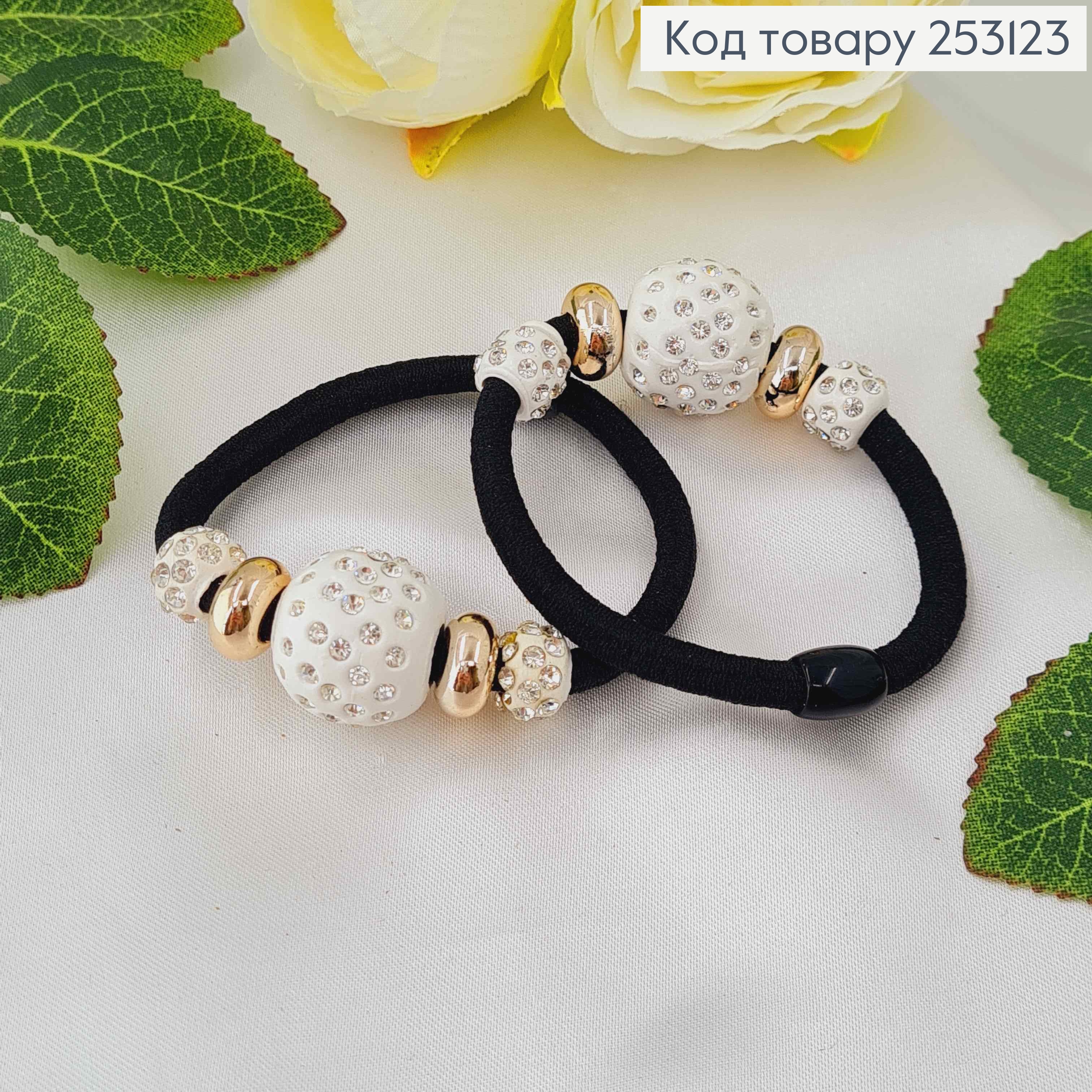 Резинка чорна, з шамбалами золотого та білого кольору в камінцях 253123 фото 1