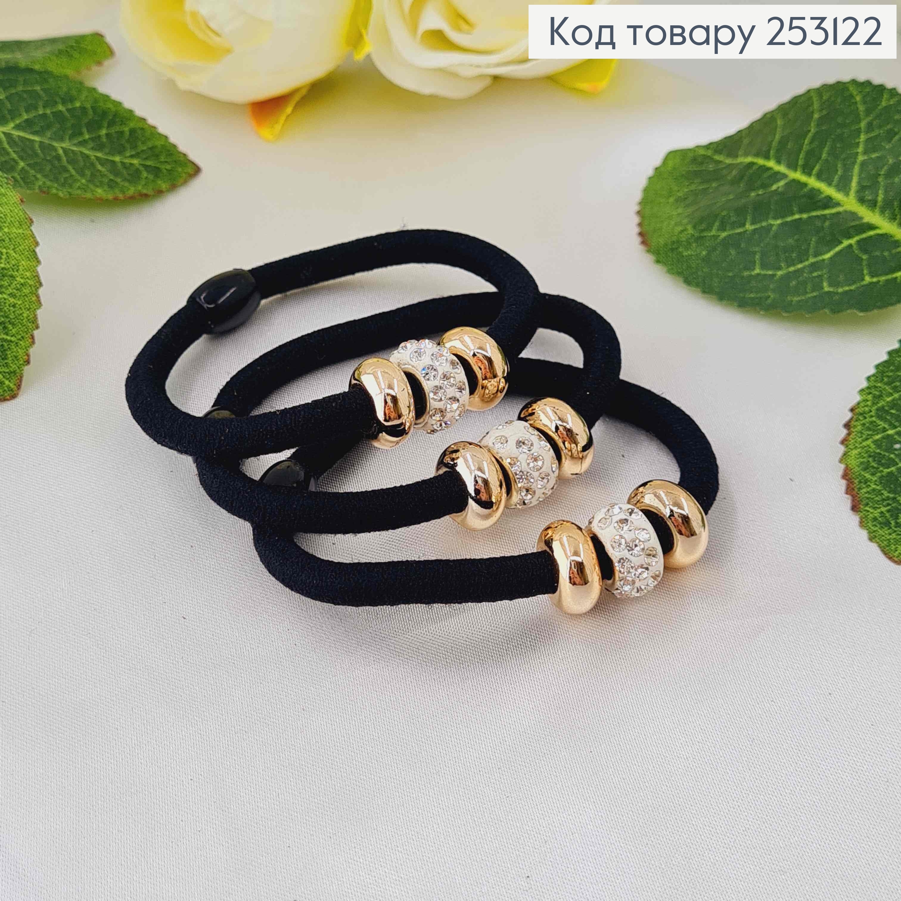 Резинка чорна, з шамбалою золотого кольору, та білого кольору в камінцях 253122 фото 1