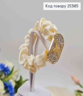 Резинка жатка 6см, Молочного кольору, з пластинкою "Луї Вітон" в камінцях 253185 фото