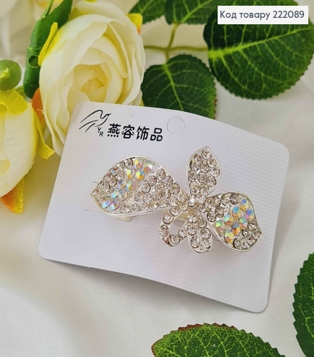 Заколка автомат металл 6*3см Бантик в камешках серебряного цвета 222089 фото 1