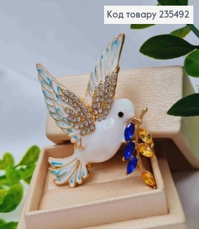 Брошка "Голуб Миру" прикрашений камінцями, 5,5см, з Білою емаллю та Жовто-Синіми камінцями 235492 фото