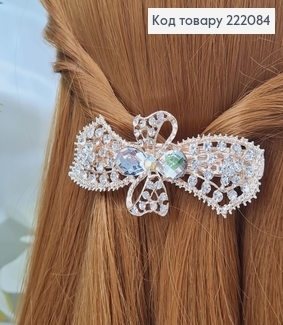 Заколка автомат металл 8,5*3,3см  БАНТИК в камінцях золотого кольору 222084 фото