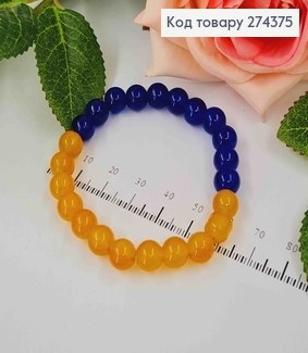 Браслет на резинці, з Синьо-Жовтих напівпрозорих бусинок 274237 фото