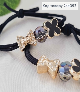 Резинка, чорна з бантиками, бусинками та чотирилисниками  244093 фото