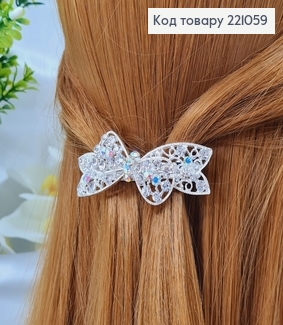 Заколка автомат металл 7*2см БАНТИК в камнях серебряного цвета  221059 фото