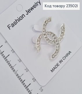 Брошь металл серебряна Шанель с камнями  235021 фото