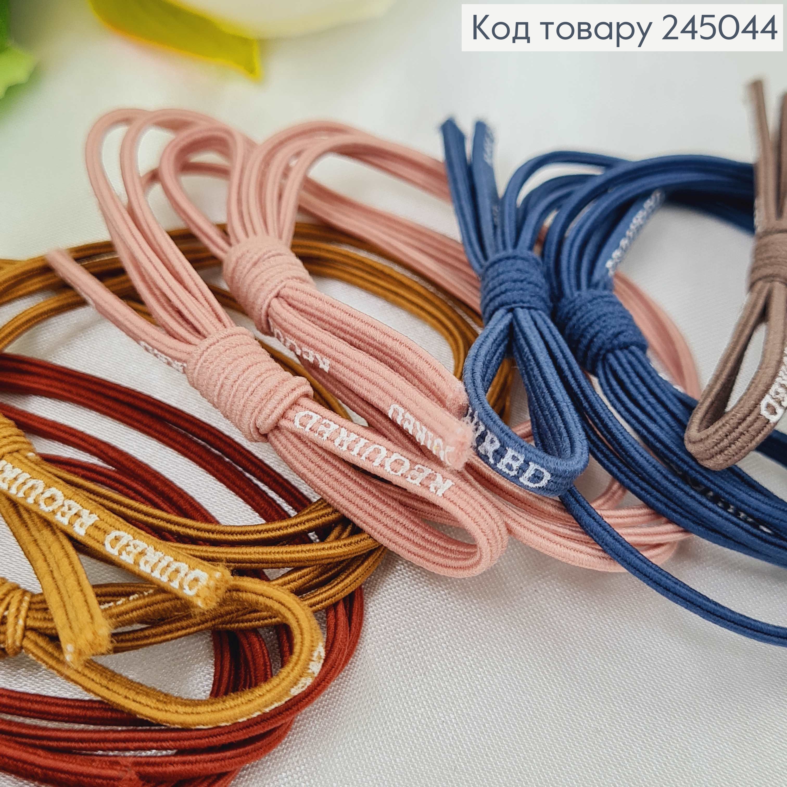 Резинка Бантик с надписью в асс. 50 шт / уп. цена за уп. 245044 фото 1