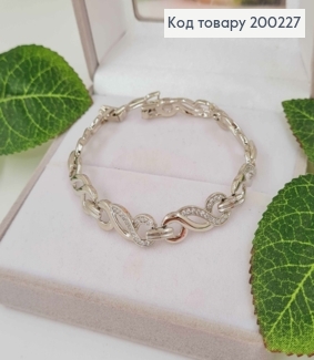 Браслет родований, пластинки кручені в камінцях, шир.0,8см, довж. 17,5+2см, Xuping  200227 фото