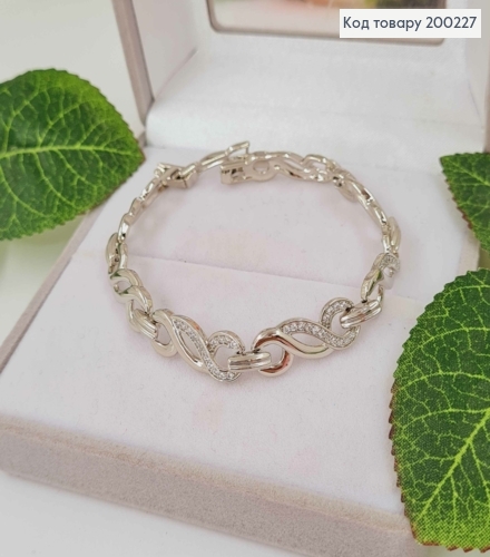 Браслет родований, пластинки кручені в камінцях, шир.0,8см, довж. 17,5+2см, Xuping  200227 фото 1