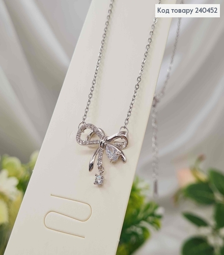 Цепочка серебряного цвета, с подвеской Бантиком, в камешках, 42+5см, сталь Stainless Steel 240452 фото 1