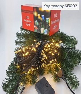 Гирлянда 300 LED 18 м черная проволока белая теплая 613002 фото