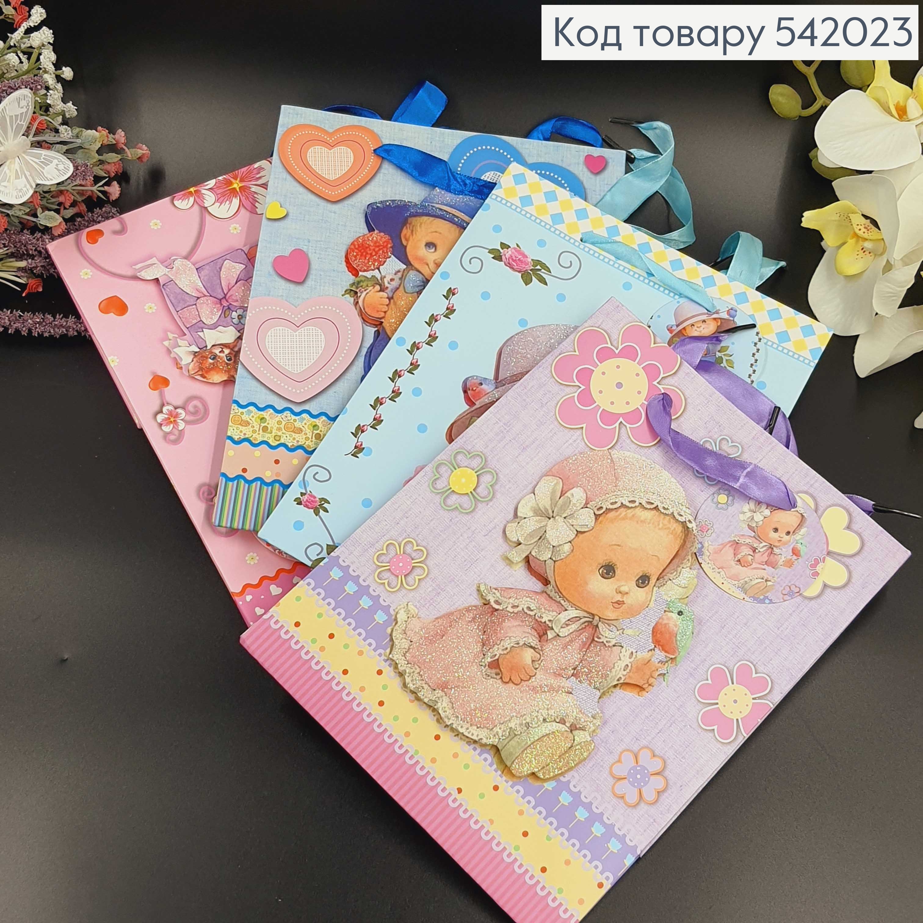 Пакет бумажный средний Ребенок блеск 23х17,5 см в асс. 542023 фото 1