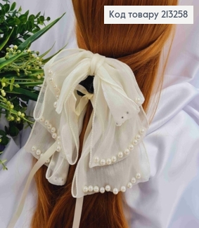 Краб пластик (4см), украшенный Бантиком из органзы и Бусинками (17см), цвета Айвори. 213258 фото